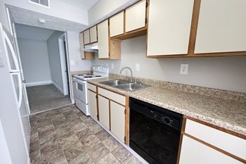Kitchen with cabinets and appliances